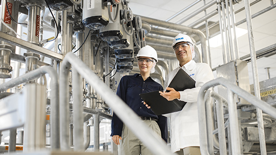 Cosmetics manufacturer consulting with an Ecolab Life Sciences expert