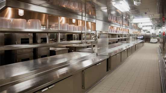Sani Wash N Walk清洁消毒剂 Restaurant kitchen with clean floors and shining silverware equipment after receiving floor and commercial drain cleaning treatment.