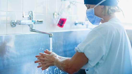 Doctor washing hands