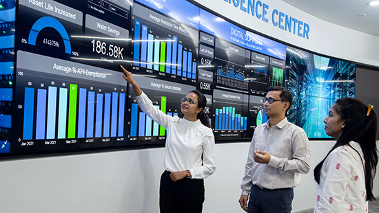 Ecolab Pune Hub with three Ecolab associates
