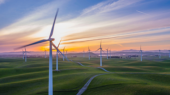 Windmills at sunset