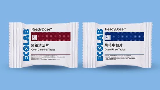 Two Ecolab ReadyDose packets displayed side by side - Oven Cleaning Tablet and Oven Rinse Tablet.