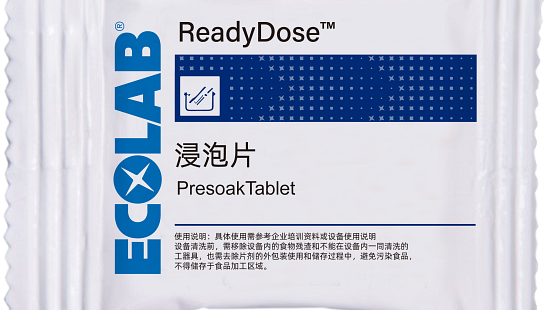 A packet of Ecolab ReadyDose Presoak Tablet.