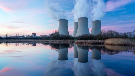 Nuclear power plant after sunset.